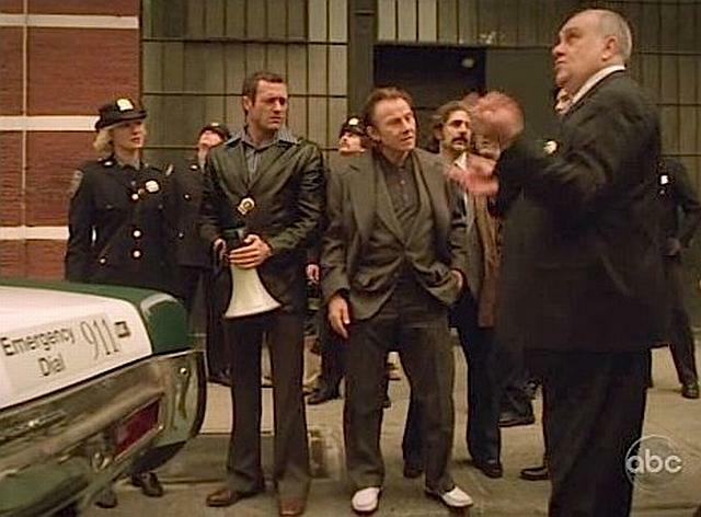 Members of the 125th Precinct pondering a technological question