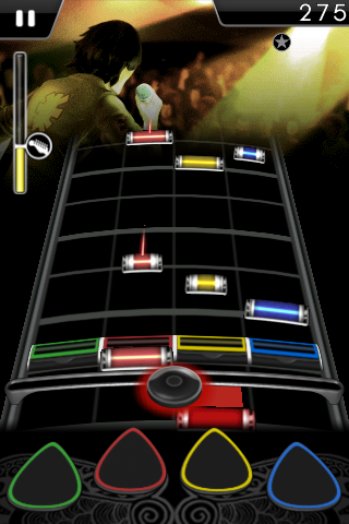 Figure 2- The Guitar and Bass playing screen in Rock Band for iPhone